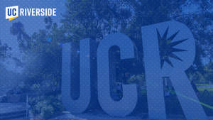 Caption: Blue Hued Image Of Ucr Campus Entrance Sign Wallpaper