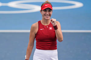 Caption: Celebration Time! Belinda Bencic's Excited Fist Pump Wallpaper