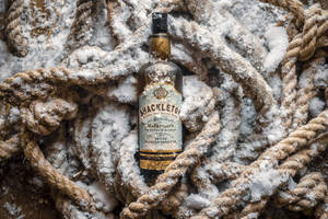 Caption: Chilled Shackleton Whisky In An Arctic Setting Wallpaper