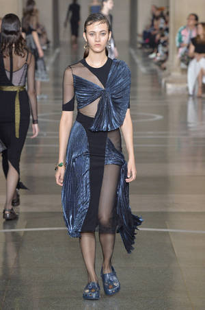 Caption: Christopher Kane's Exquisite Black And Blue Dress Wallpaper