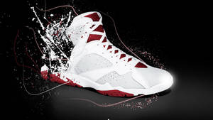 Caption: Classic Red And White Jordan 7 Basketball Shoes Wallpaper