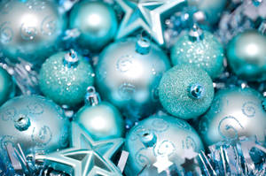 Caption: Cyan Christmas Baubles Adorning The Festive Holidays Wallpaper