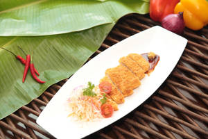 Caption: Delicious Tonkatsu On Banana Leaves Wallpaper