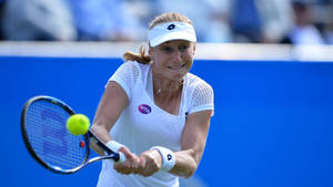 Caption: Ekaterina Makarova In Action During A Tennis Match Wallpaper