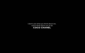 Caption: Elegant Black And White Coco Chanel Aesthetic Laptop View Wallpaper