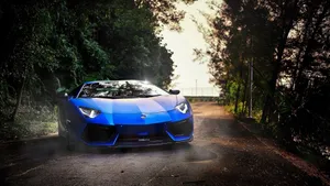 Caption: Elegant Blue Lamborghini Aventador Wallpaper