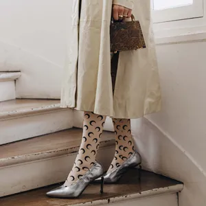 Caption: Elegant Silver High Heels By Clergerie Wallpaper