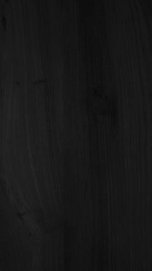 Caption: Enigmatic Wooden Panel Wall In Darkness Wallpaper