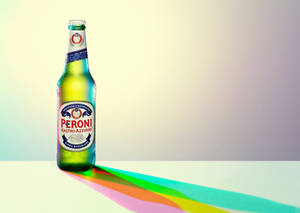 Caption: Enjoying A Chilled Peroni Beer At Sunset Wallpaper