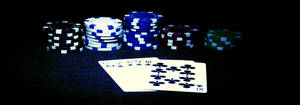 Caption: Excitement In Five-card Draw Poker Game Wallpaper