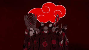Caption: Fierce Akatsuki Logo With Shinobi Ninjas In Battle Stance Wallpaper