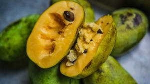 Caption: Fresh Pawpaw Fruit On Display Wallpaper
