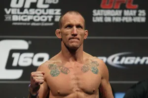 Caption: Gray Maynard In Action Stance Wallpaper