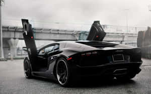 Caption: High Speed Adrenaline - Sports Car In Action Wallpaper
