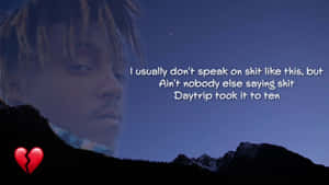Caption: Inspirational Juice Wrld Quote On Grungy Background Wallpaper