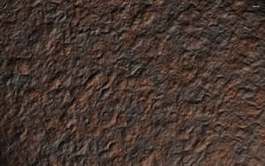 Caption: Intricate Brown Stone Texture Wallpaper