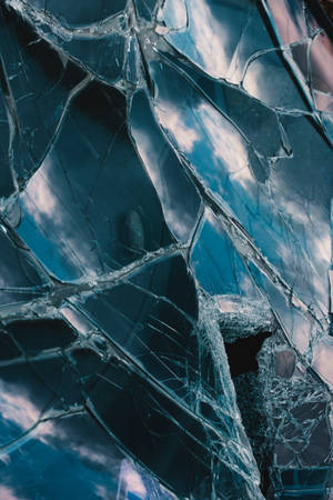 Caption: Intricate Splendor Of Shattering Glass Wallpaper