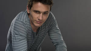 Caption: James Franco In A Captivating Grey Photoshoot Wallpaper