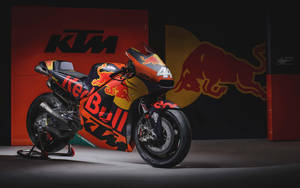 Caption: Ktm 4k Motorcycle Adorned With Red Bull Accents Wallpaper