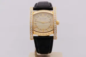 Caption: Luxurious Gold And Black Bvlgari Watch Wallpaper