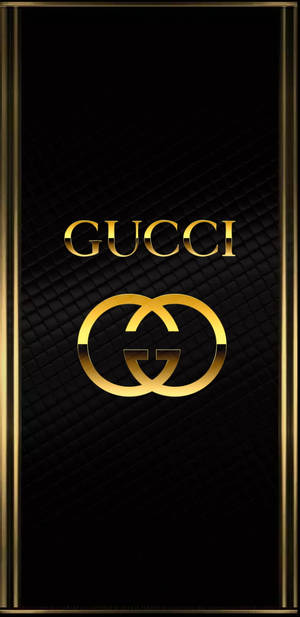 Caption: Luxurious Iphone 12 Pro Max Gold With Gucci Logo Wallpaper