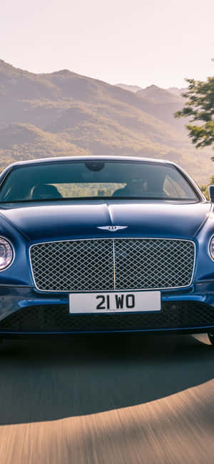 Caption: Luxurious Ride On A Bently With Iphone Wallpaper