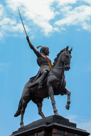 Caption: Majestic Chhatrapati Shivaji Maharaj Statue Riding On Horseback Wallpaper