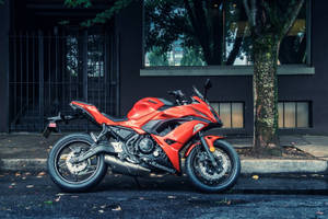 Caption: Majestic Red Kawasaki H2r Motorcycle Wallpaper