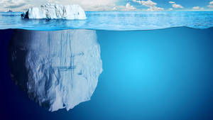 Caption: Mesmerizing Arctic Iceberg Wallpaper