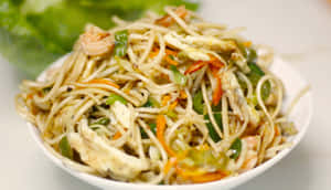 Caption: Prawn And Egg Noodles Delight Wallpaper