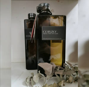 Caption: Premium Corzo Anejo Tequila Bottles Wallpaper