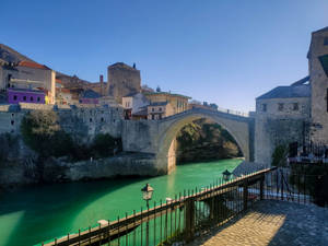 Caption: Scenic View Of The Ottoman Bridge In Mostar, Bosnia And Herzegovina Wallpaper