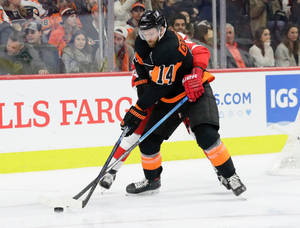 Caption: Sean Couturier Of The Philadelphia Flyers In Action Wallpaper