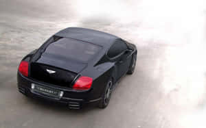 Caption: Sleek And Sophisticated Bentley Sport Wallpaper