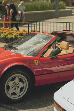 Caption: Stunning Ferrari Showcasing The Vivid Clarity Of The Iphone 11 Pro Max 4k Resolution. Wallpaper