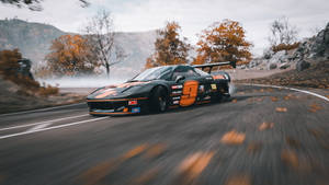 Caption: Stunning Orange And Black Honda Nsx Excelling In Drift Racing Wallpaper