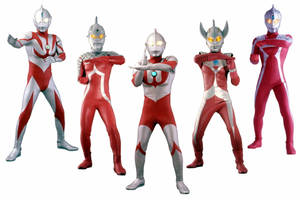Caption: Ultraman In High Definition Standing Tall On A White Background Wallpaper