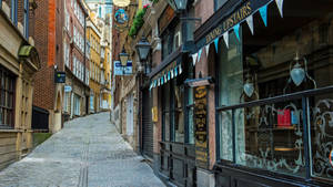 Caption: Unique Shop At The Heart Of Lovat Lane Alley Wallpaper