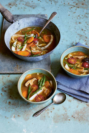 Caption: Vibrant And Delicious Tom Yum Soup For Two Wallpaper