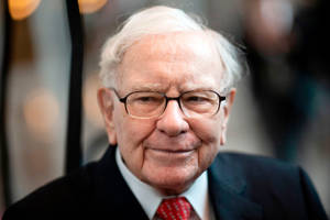 Caption: Warren Buffett, The Sage Of Omaha, In A Candid Close-up Portrait Wallpaper