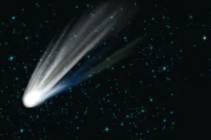 Captivating Comet In The Night Sky Wallpaper