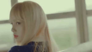 Captivating Image Of Lisa From Blackpink In Stylish Ensemble Wallpaper