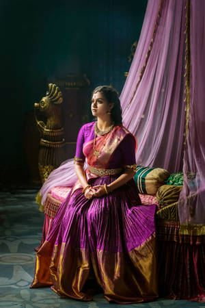 Captivating Keerthi Suresh In Elegant Violet Saree Wallpaper