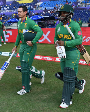 Captivating Moments Of Quinton De Kock And Ab De Villiers Wallpaper