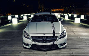 Captivating Night-time Prowess Of White Amg Wallpaper