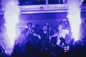 Captivating Nightlife: Electric Dancefloor Vibes Wallpaper