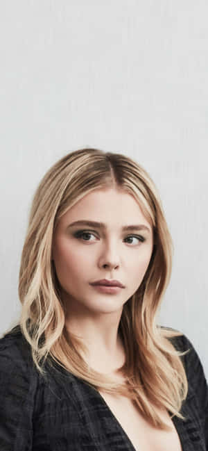 Captivating Portrait Photography Of American Actress Chloe Grace Moretz Wallpaper