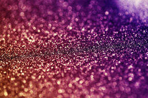 Captivating Purple-pink Glitter Sparkles Wallpaper