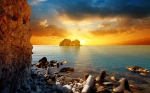 Captivating Sunset Over Tranquil Lake Wallpaper