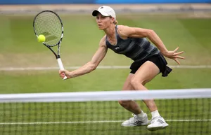 Cara Black In Action During A Tennis Match Wallpaper